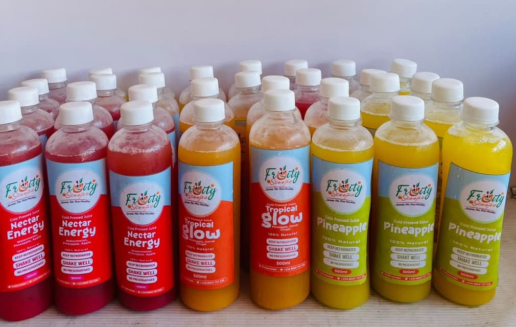 Rows of Nectar Energy, Tropical Glow and Pineapple juice bottles